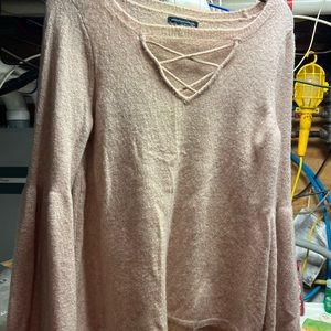 Woman's soft light pink sweater